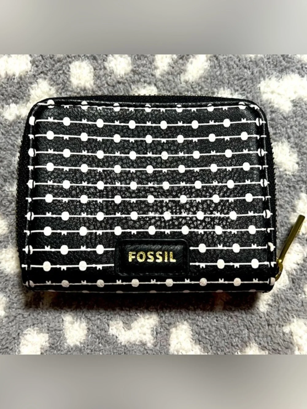 Fossil Logan zip-around bifold wallet, black & white dotted lines, gold hardware